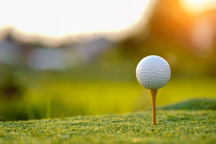 close-up on a golf ball on a tee